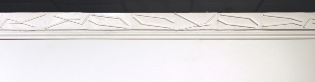 Straw Molding, 2018 Wall installation. Plaster casts of straws arranged into crown molding, 